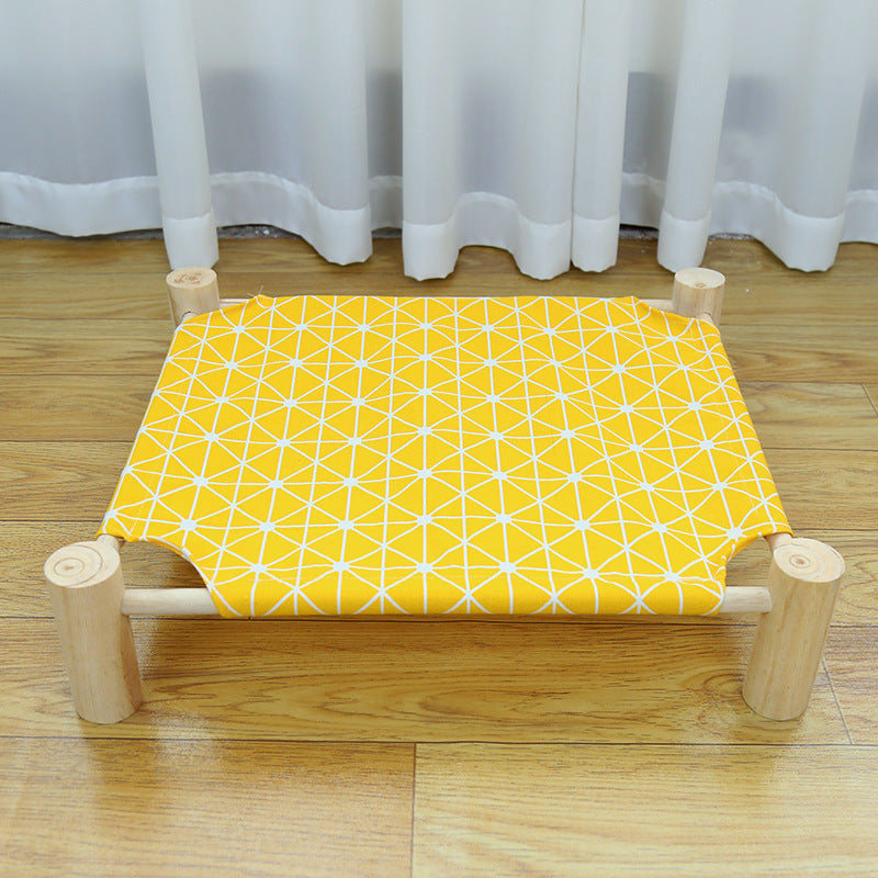 Wooden camping-style pet bed