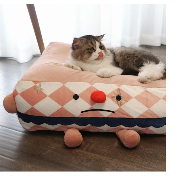 Clown-themed cozy pet sleeping bed